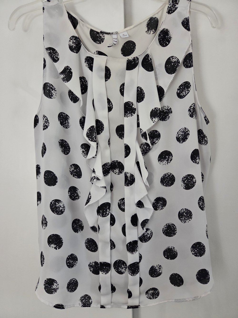 Elle White Sleeveless Polka Dot Ruffled Blouse